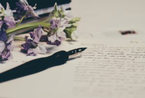 Lyme letter with pen and flowers